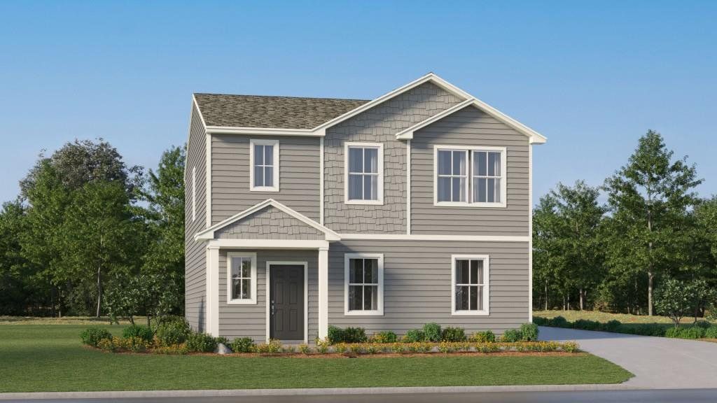 Front exterior of a new home in The Stables, Rossville, GA, highlighting curb appeal (Image 1).