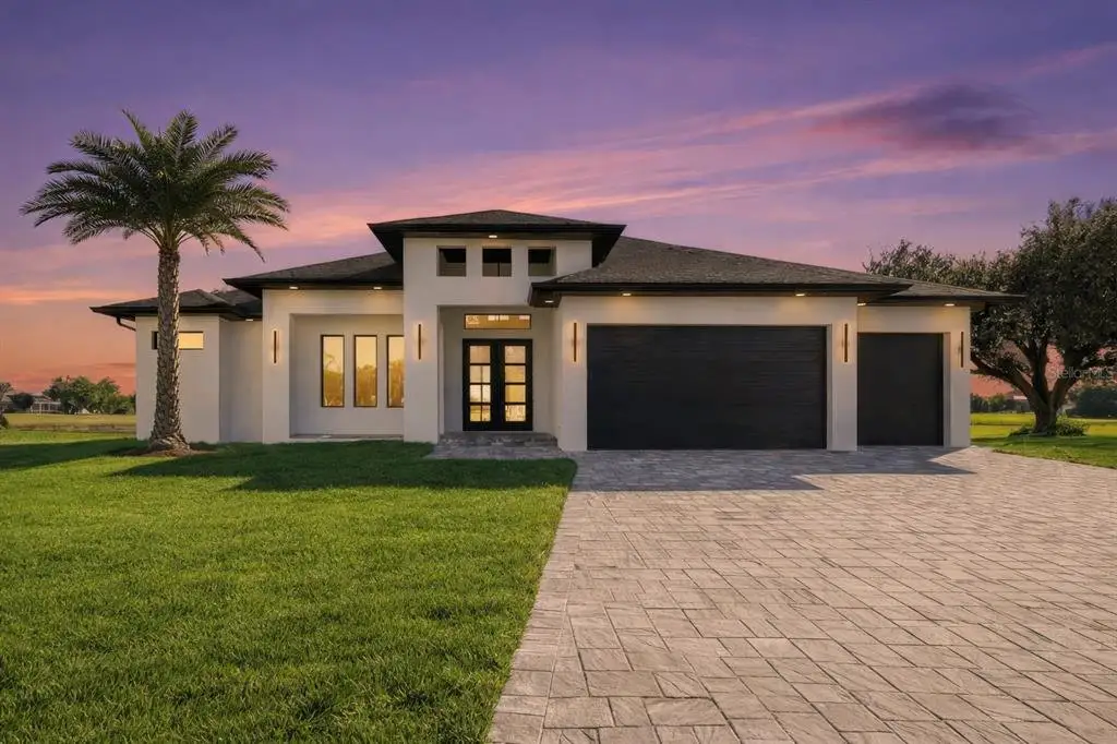 Front exterior of a new home in , Rotonda West, FL, highlighting curb appeal (Image 1). Front exterior of a new home in , Rotonda West, FL, highlighting curb appeal (Image 1).