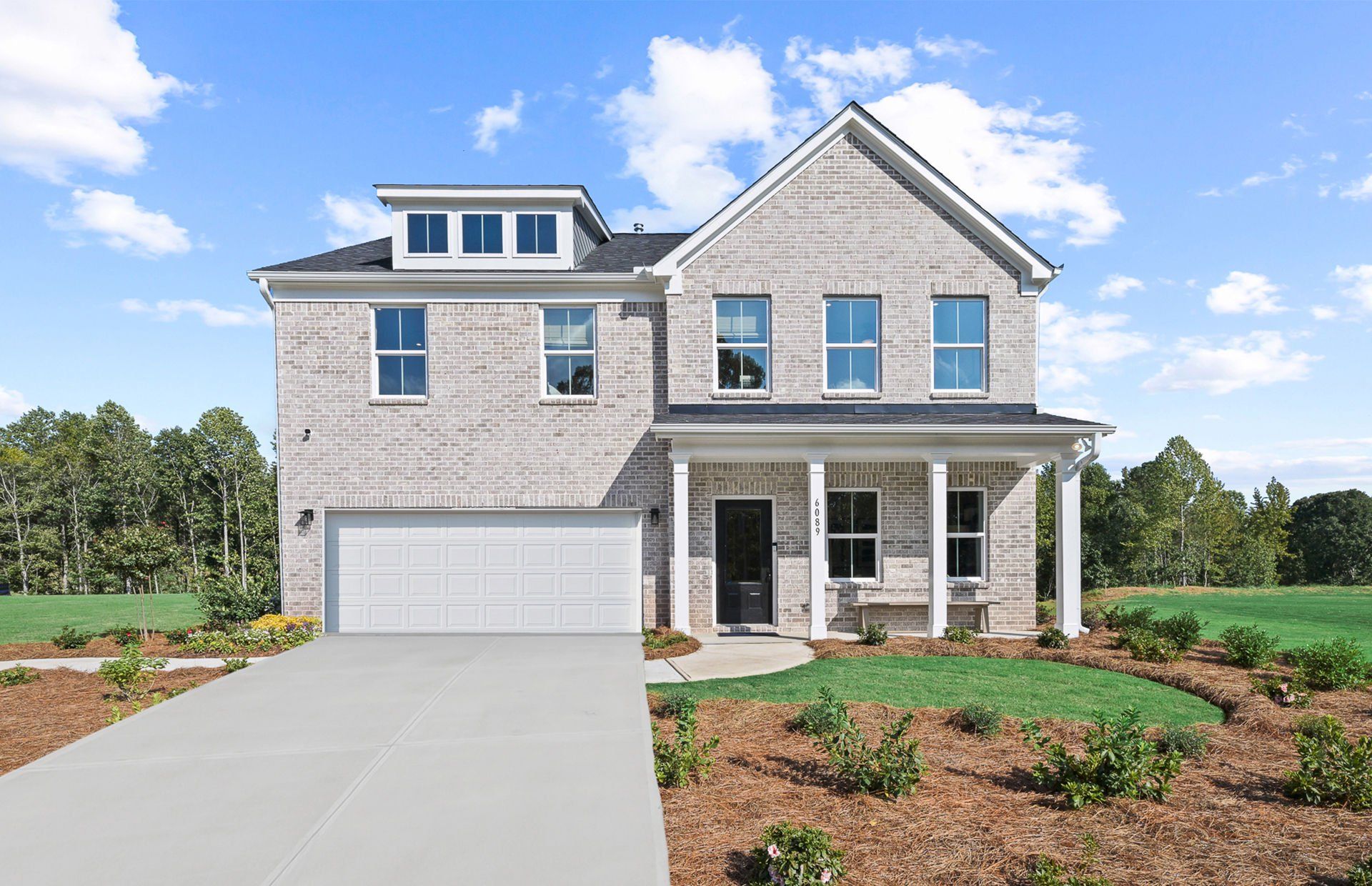 Front exterior of a new home in Briar Creek, Atlanta, GA, highlighting curb appeal (Image 1). Front exterior of a new home in Briar Creek, Atlanta, GA, highlighting curb appeal (Image 1).