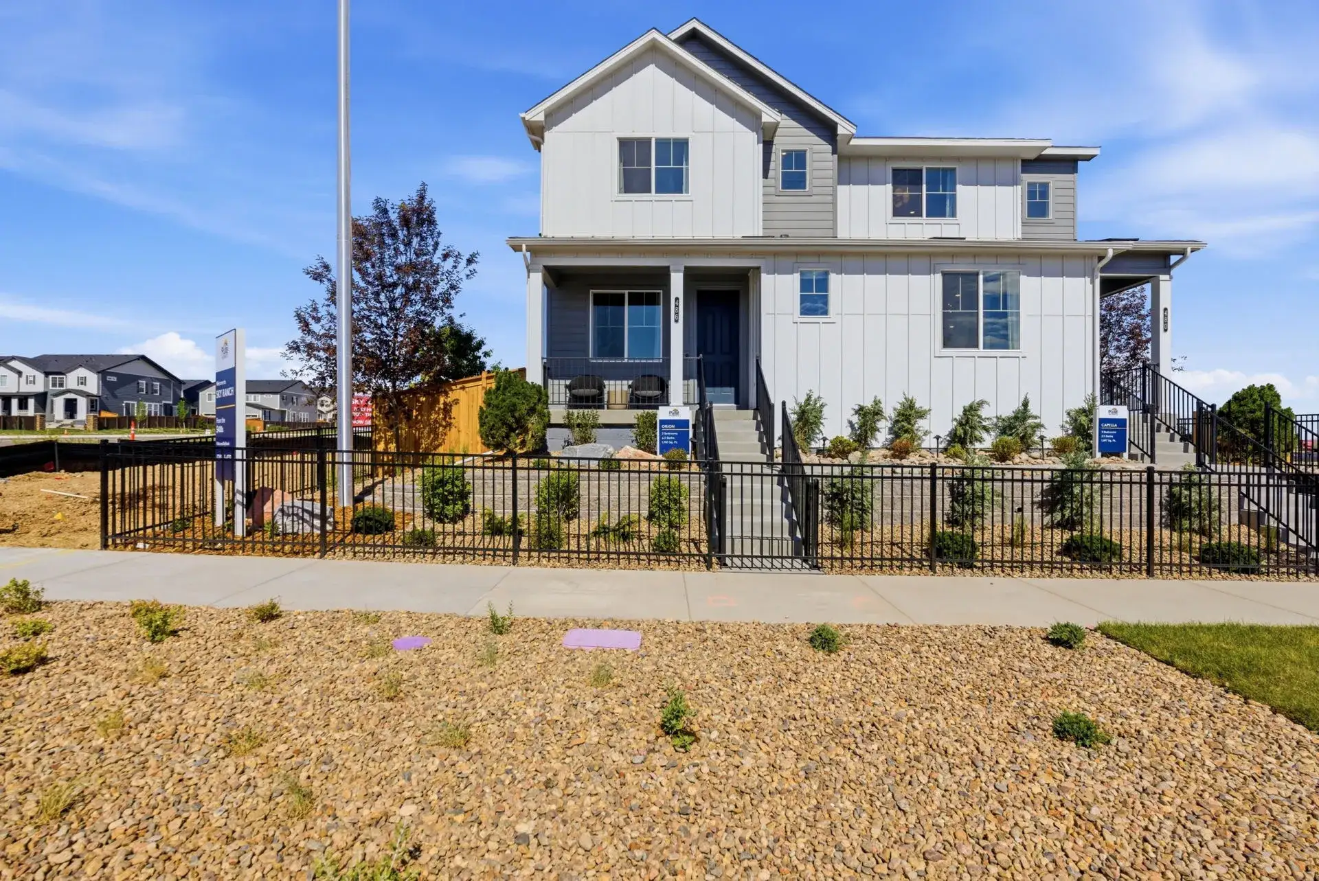 Front exterior of a new home in Sky Ranch, Watkins, CO, highlighting curb appeal (Image 1). Front exterior of a new home in Sky Ranch, Watkins, CO, highlighting curb appeal (Image 1).