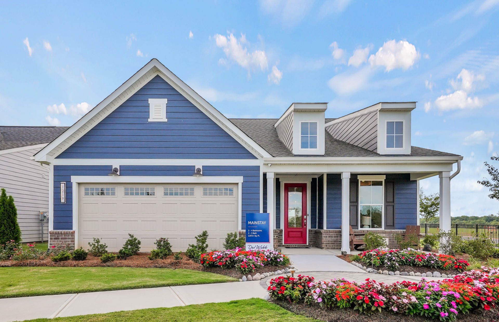 Front exterior of a new home in Carolina Riverside, Belmont, NC, highlighting curb appeal (Image 1). Front exterior of a new home in Carolina Riverside, Belmont, NC, highlighting curb appeal (Image 1).