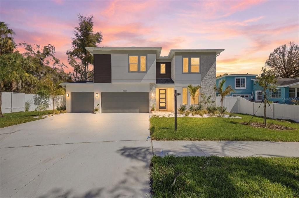 Front exterior of a new home in , Tampa, FL, highlighting curb appeal (Image 1). Front exterior of a new home in , Tampa, FL, highlighting curb appeal (Image 1).