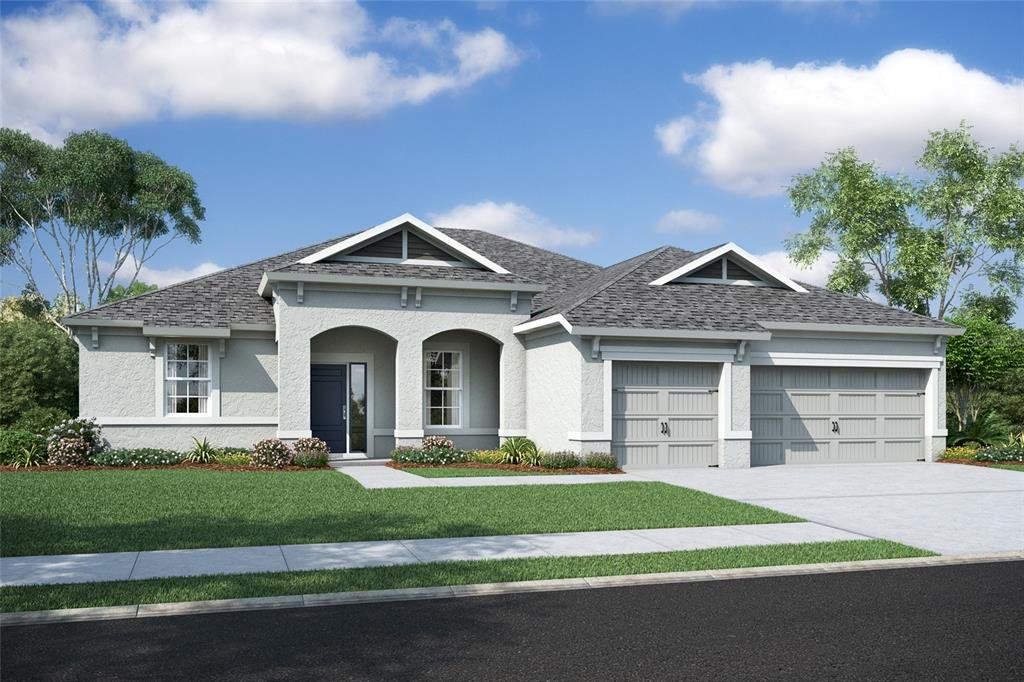 Front exterior of a new home in Cascades at Southern Hills, Brooksville, FL, highlighting curb appeal (Image 1). Front exterior of a new home in Cascades at Southern Hills, Brooksville, FL, highlighting curb appeal (Image 1).