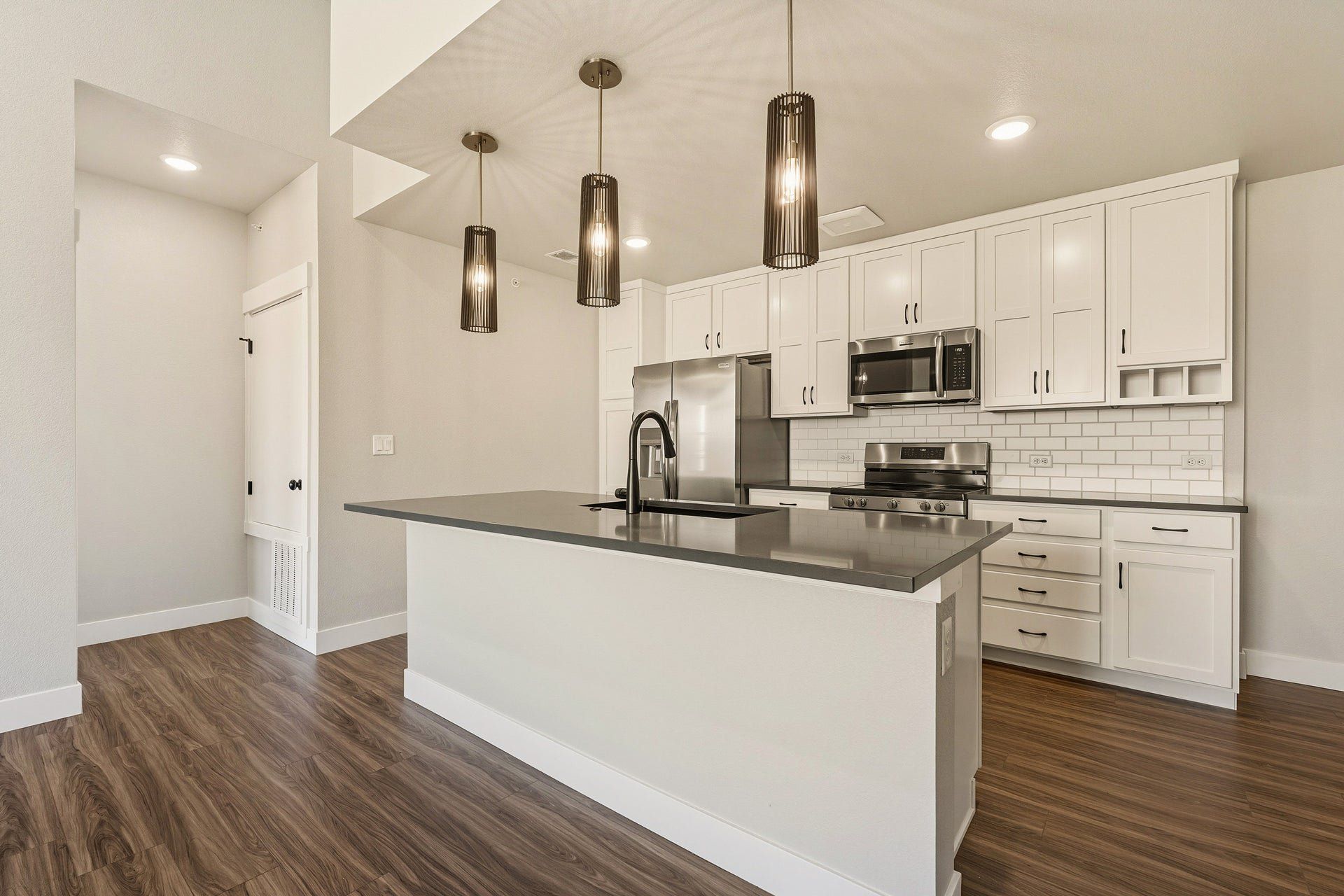 Furnished interior view inside a new home in The Lakes at Centerra - North Shore Flats, Loveland (Image 1).