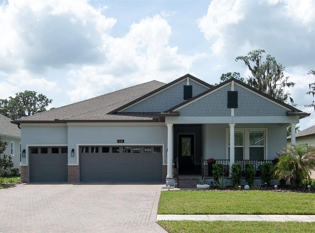 Front exterior of a new home in , Brooksville, FL, highlighting curb appeal (Image 1).