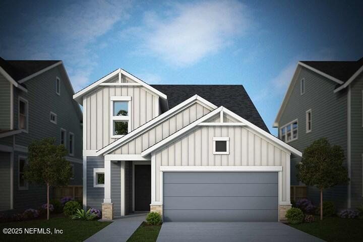 Front exterior of a new home in Evergreen Island at Silverleaf - Classic, St. Augustine, FL, highlighting curb appeal (Image 1).