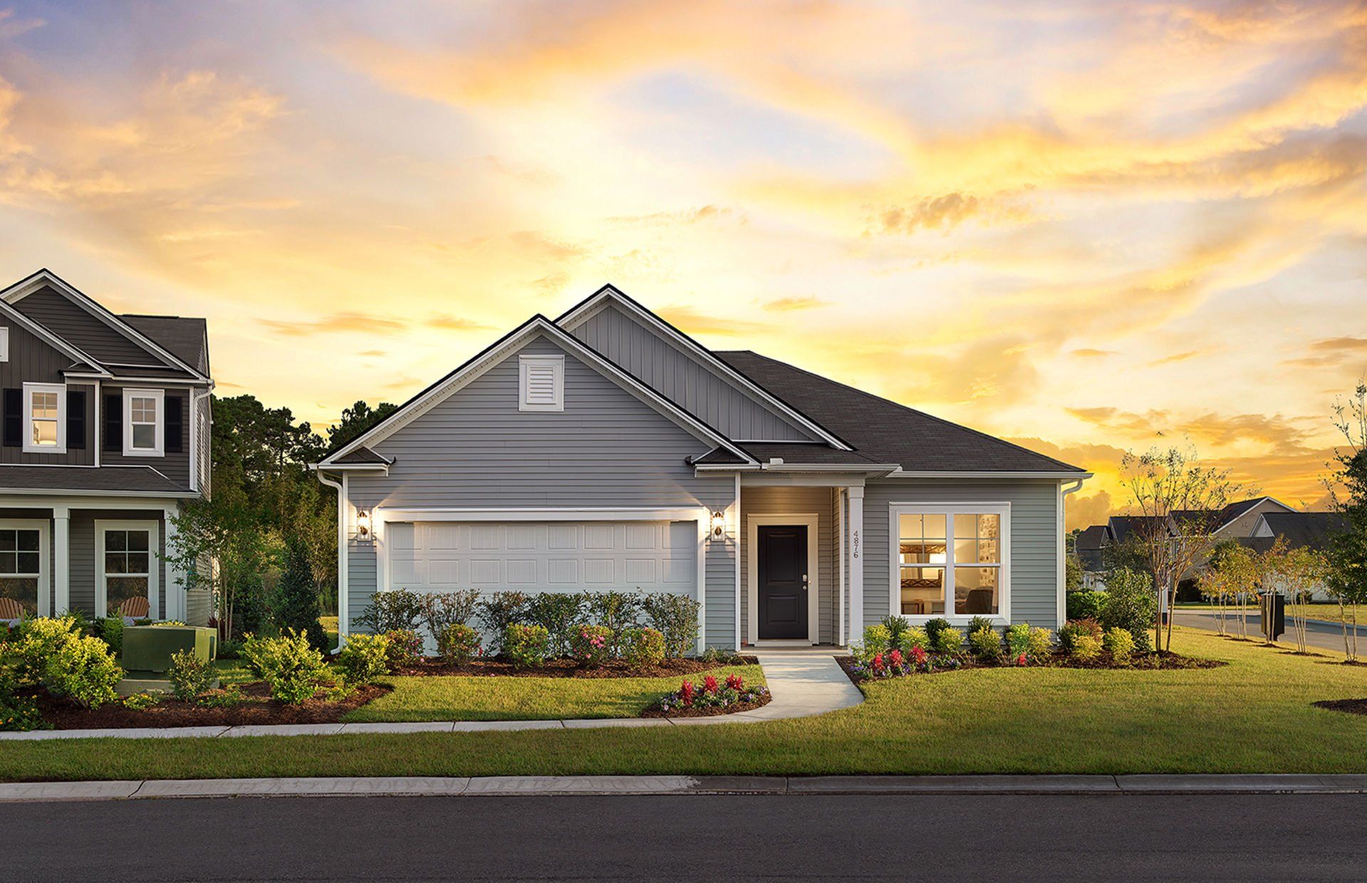 Front exterior of a new home in Solserra, Shallotte, NC, highlighting curb appeal (Image 1). Front exterior of a new home in Solserra, Shallotte, NC, highlighting curb appeal (Image 1).