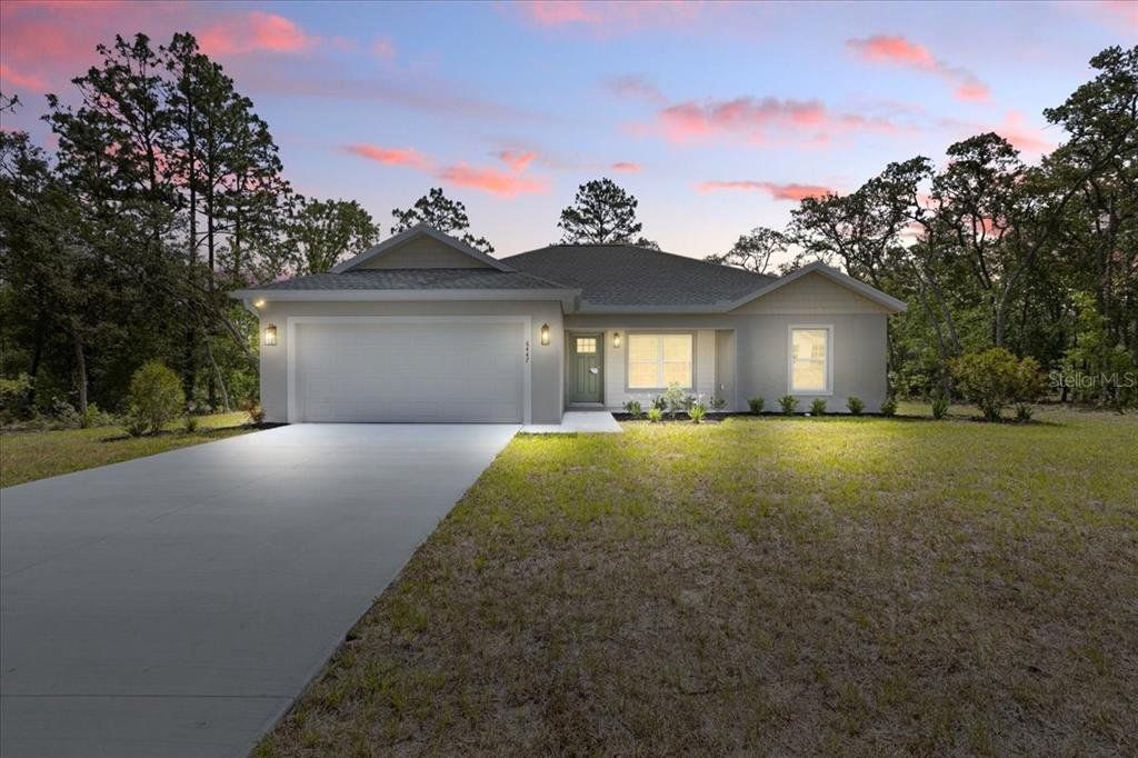 Front exterior of a new home in , Citrus Springs, FL, highlighting curb appeal (Image 1). Front exterior of a new home in , Citrus Springs, FL, highlighting curb appeal (Image 1).