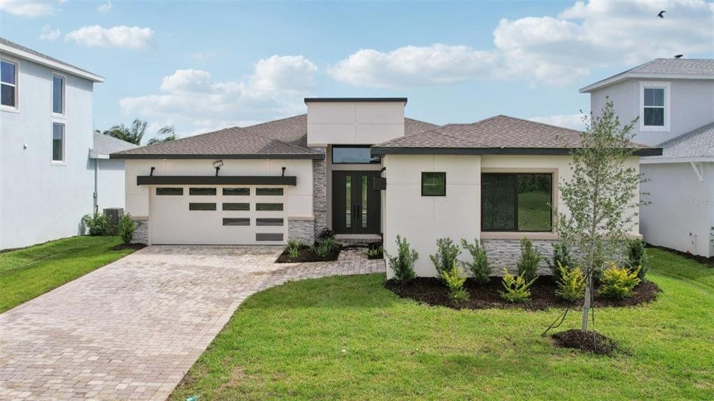 Exterior details and patio area of a home in Biscayne Landing at Seaire, Parrish (Image 1). Exterior details and patio area of a home in Biscayne Landing at Seaire, Parrish (Image 1).