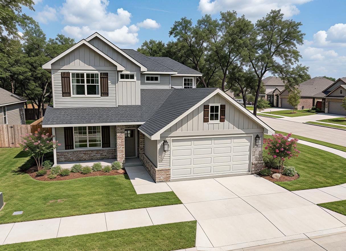 Front exterior of a new home in Rudder Pointe, Bryan, TX, highlighting curb appeal (Image 1). Front exterior of a new home in Rudder Pointe, Bryan, TX, highlighting curb appeal (Image 1).