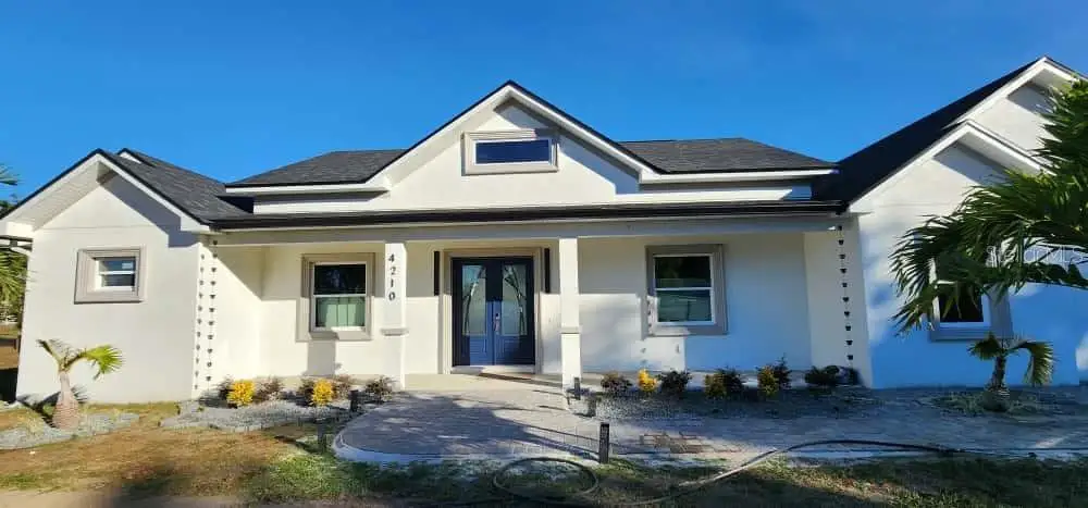 Front exterior of a new home in , Plant City, FL, highlighting curb appeal (Image 1). Front exterior of a new home in , Plant City, FL, highlighting curb appeal (Image 1).