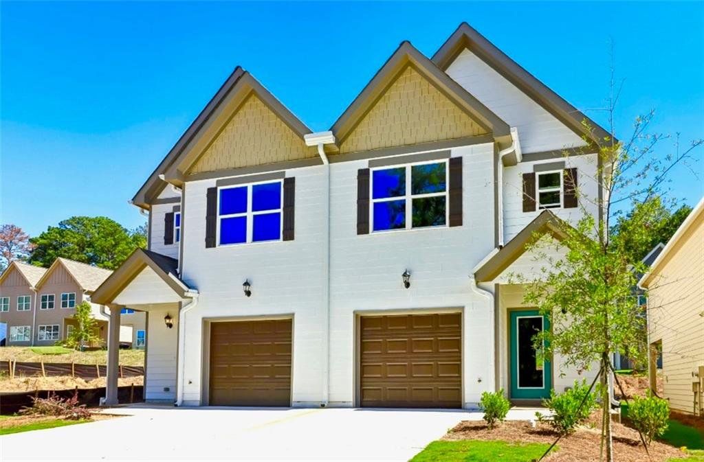 Front exterior of a new home in SouthTown, Atlanta, GA, highlighting curb appeal (Image 1).