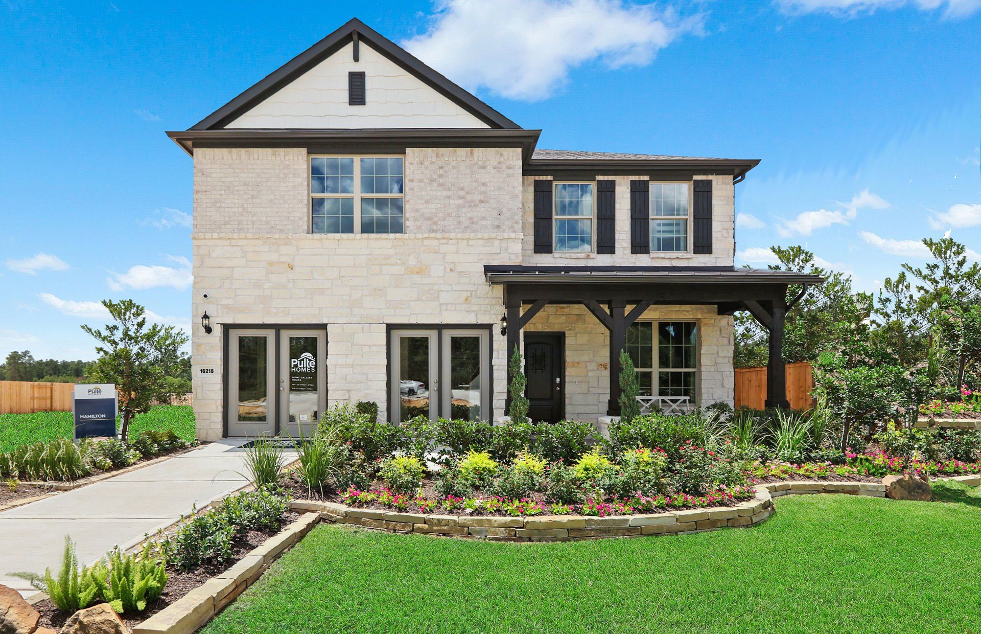Front exterior of a new home in Mavera, Conroe, TX, highlighting curb appeal (Image 1). Front exterior of a new home in Mavera, Conroe, TX, highlighting curb appeal (Image 1).