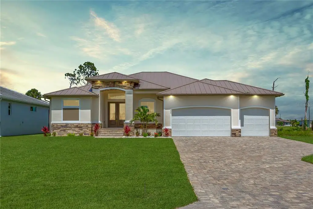 Front exterior of a new home in , Rotonda West, FL, highlighting curb appeal (Image 1). Front exterior of a new home in , Rotonda West, FL, highlighting curb appeal (Image 1).