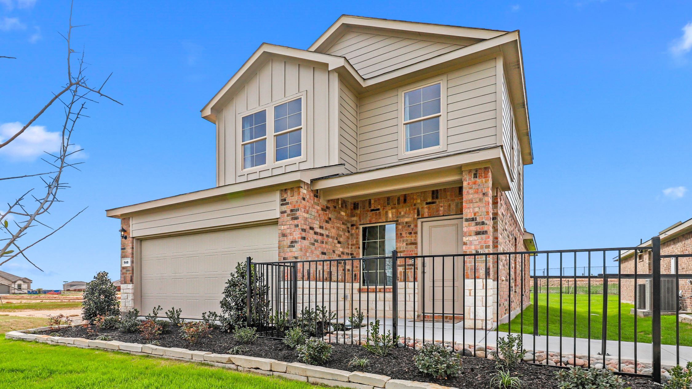 Representative exterior photo of a completed home built from the HANNA by D.R. Horton in Springhill South, Boyd, TX (Image 1). Representative exterior photo of a completed home built from the HANNA by D.R. Horton in Springhill South, Boyd, TX (Image 1).