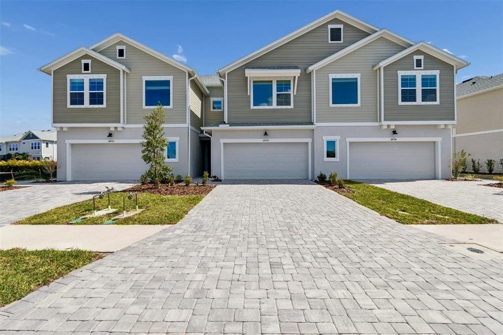 Front exterior of a new home in , Parrish, FL, highlighting curb appeal (Image 1). Front exterior of a new home in , Parrish, FL, highlighting curb appeal (Image 1).