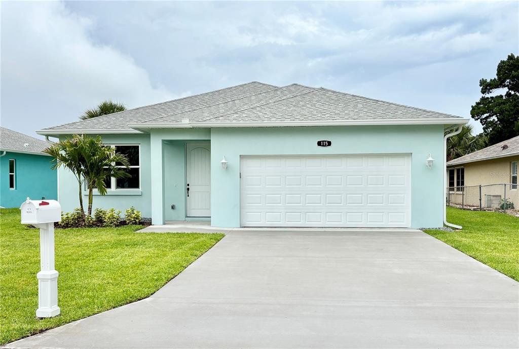 Front exterior of a new home in , Edgewater, FL, highlighting curb appeal (Image 1). Front exterior of a new home in , Edgewater, FL, highlighting curb appeal (Image 1).