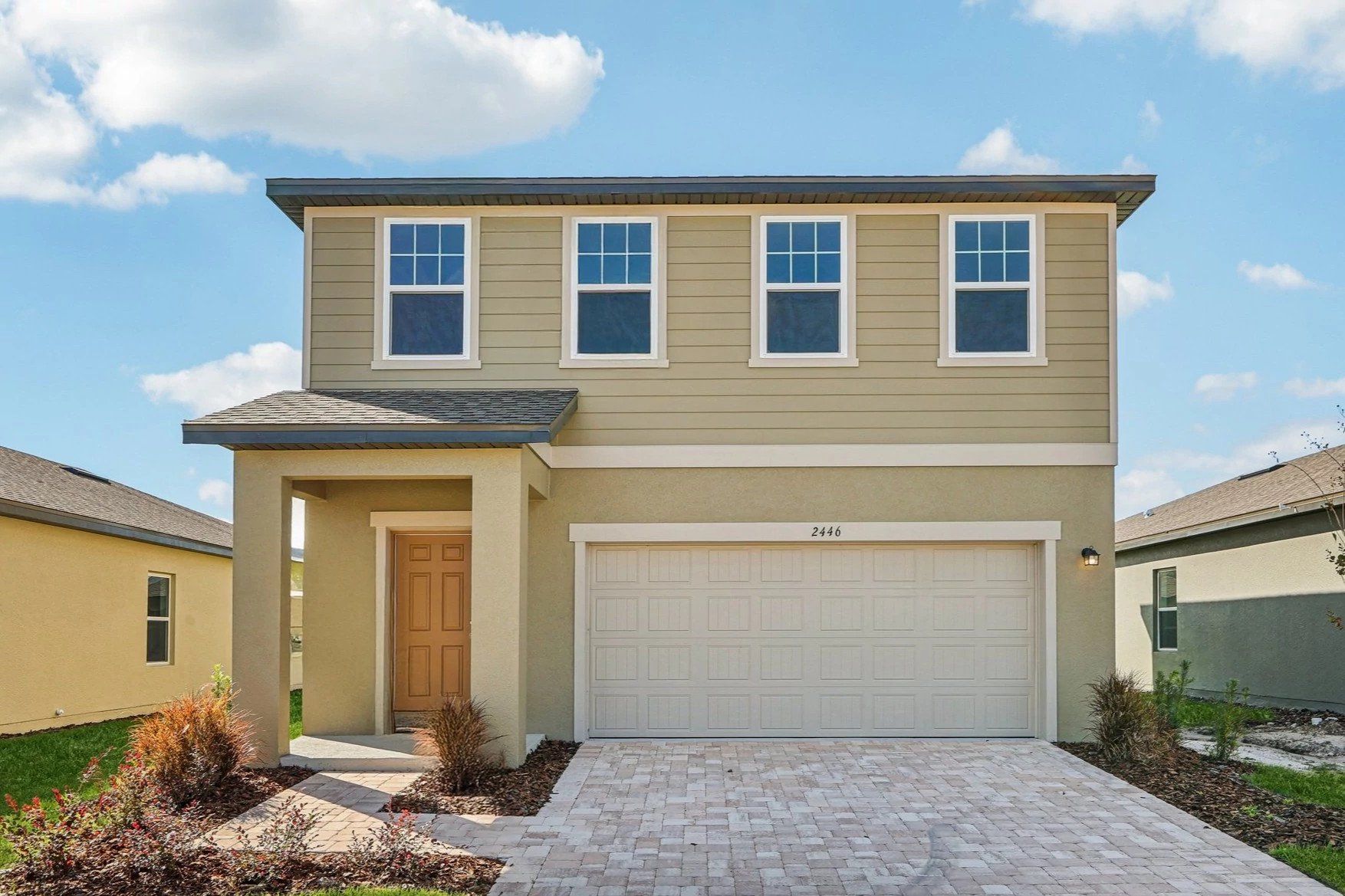 Front exterior of a new home in Landings at Mount Olive, Polk City, FL, highlighting curb appeal (Image 1). Front exterior of a new home in Landings at Mount Olive, Polk City, FL, highlighting curb appeal (Image 1).