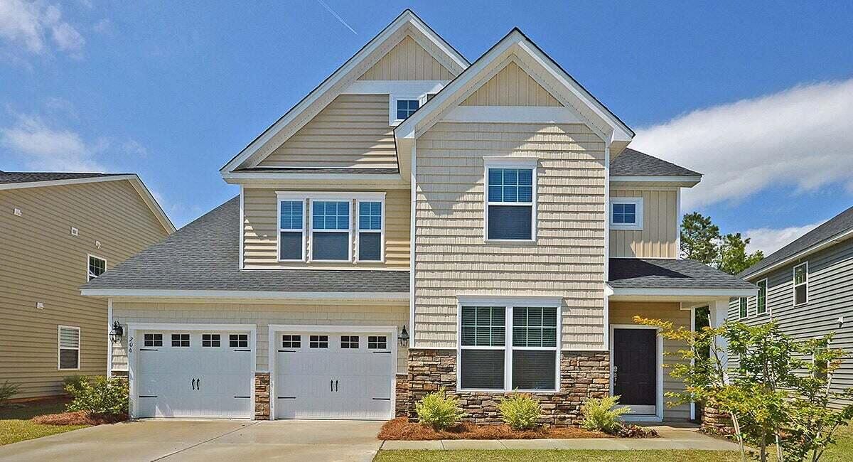 Front exterior of a new home in Cypress Preserve, Moncks Corner, SC, highlighting curb appeal (Image 1). Front exterior of a new home in Cypress Preserve, Moncks Corner, SC, highlighting curb appeal (Image 1).