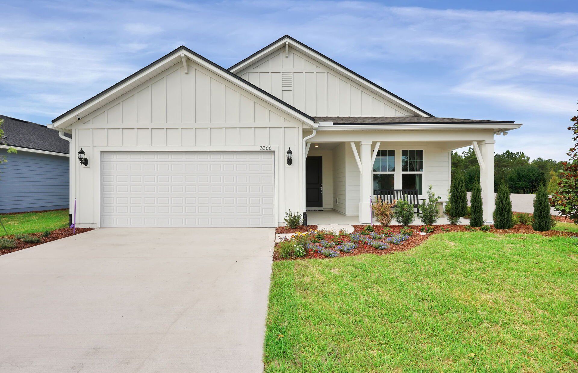 Front exterior of a new home in Hyland Trail, Green Cove Springs, FL, highlighting curb appeal (Image 1). Front exterior of a new home in Hyland Trail, Green Cove Springs, FL, highlighting curb appeal (Image 1).