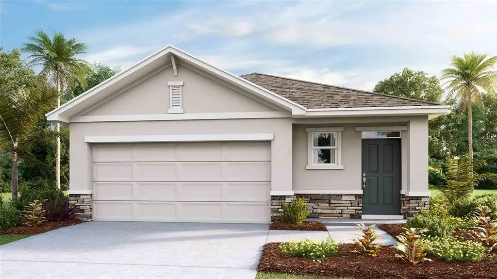 Front exterior of a new home in Deerbrook, Land O' Lakes, FL, highlighting curb appeal (Image 1). Front exterior of a new home in Deerbrook, Land O' Lakes, FL, highlighting curb appeal (Image 1).