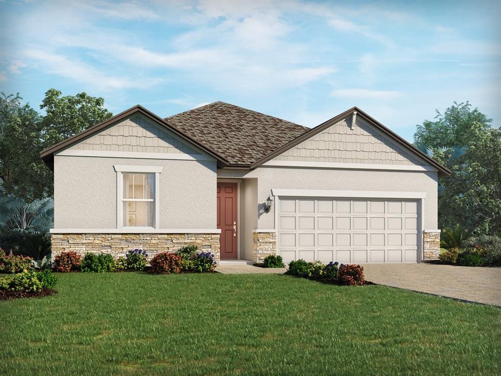 Front exterior of a new home in Legends Preserve - Signature Series, Daytona Beach, FL, highlighting curb appeal (Image 1).