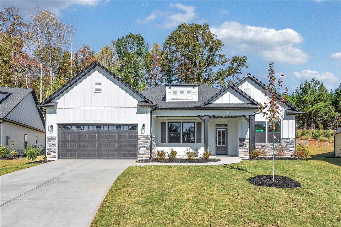 Front exterior of a new home in Edwards Ridge, Central, SC, highlighting curb appeal (Image 1). Front exterior of a new home in Edwards Ridge, Central, SC, highlighting curb appeal (Image 1).