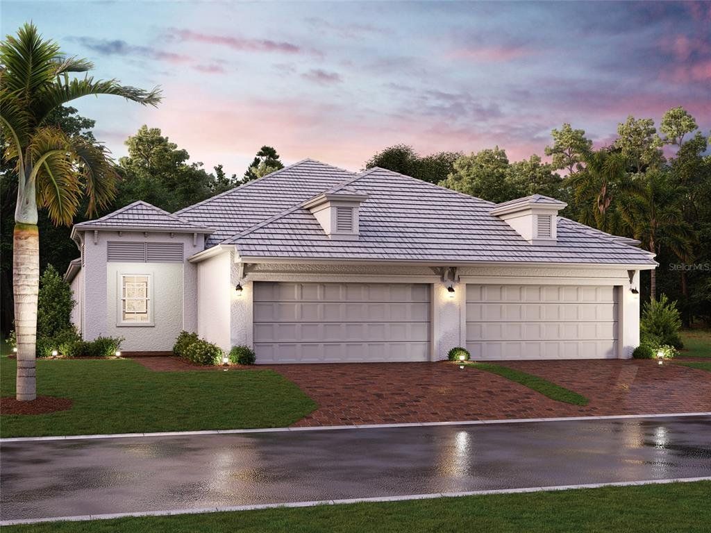 Front exterior of a new home in Sweetwater at Lakewood Ranch, Lakewood Ranch, FL, highlighting curb appeal (Image 1). Front exterior of a new home in Sweetwater at Lakewood Ranch, Lakewood Ranch, FL, highlighting curb appeal (Image 1).