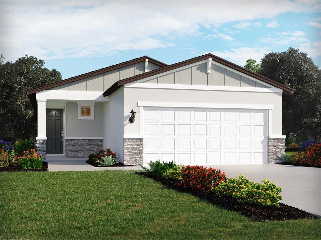Front exterior of a new home in Oakfield Trails - Premier Series, Parrish, FL, highlighting curb appeal (Image 1). Front exterior of a new home in Oakfield Trails - Premier Series, Parrish, FL, highlighting curb appeal (Image 1).