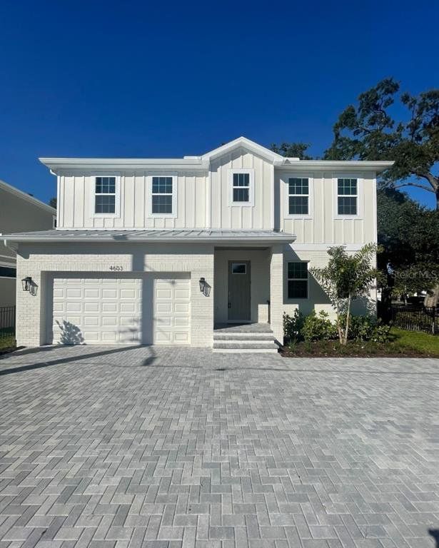 Front exterior of a new home in , Tampa, FL, highlighting curb appeal (Image 1). Front exterior of a new home in , Tampa, FL, highlighting curb appeal (Image 1).