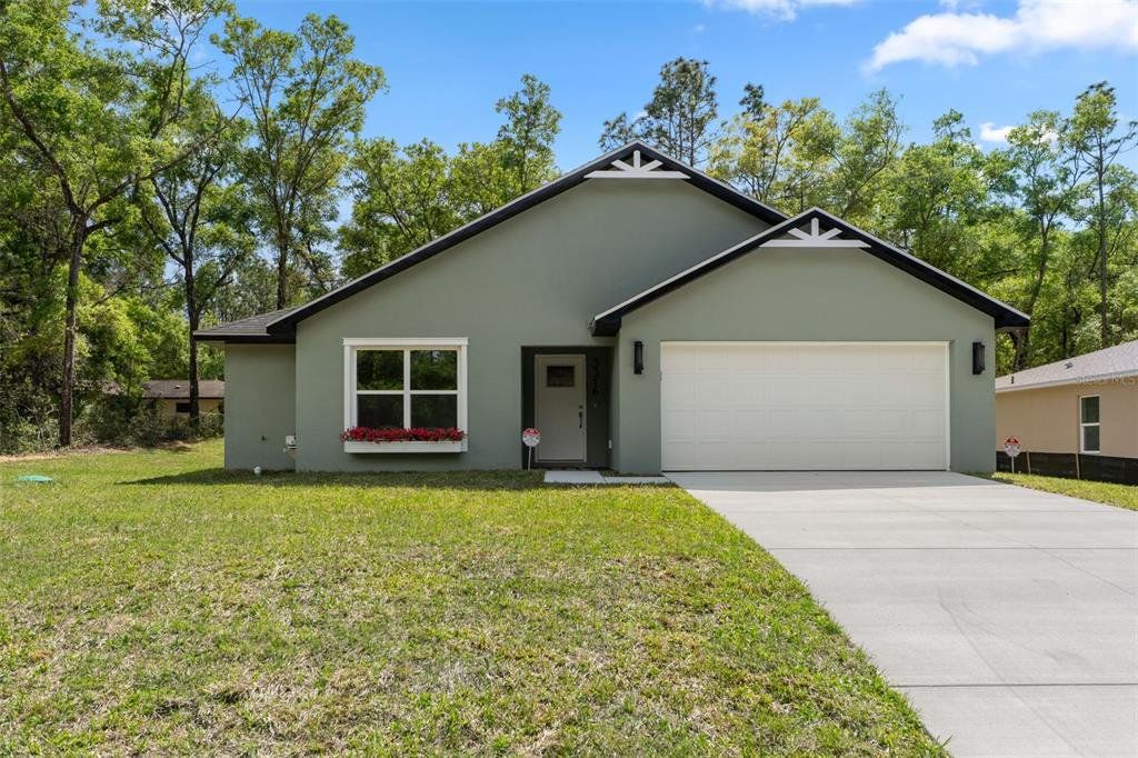 Front exterior of a new home in , Inverness, FL, highlighting curb appeal (Image 1). Front exterior of a new home in , Inverness, FL, highlighting curb appeal (Image 1).