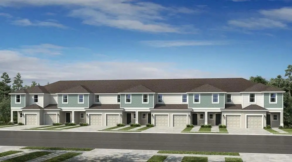 Front exterior of a new home in The Townhomes at Azario Lakewood Ranch, Bradenton, FL, highlighting curb appeal (Image 1). Front exterior of a new home in The Townhomes at Azario Lakewood Ranch, Bradenton, FL, highlighting curb appeal (Image 1).