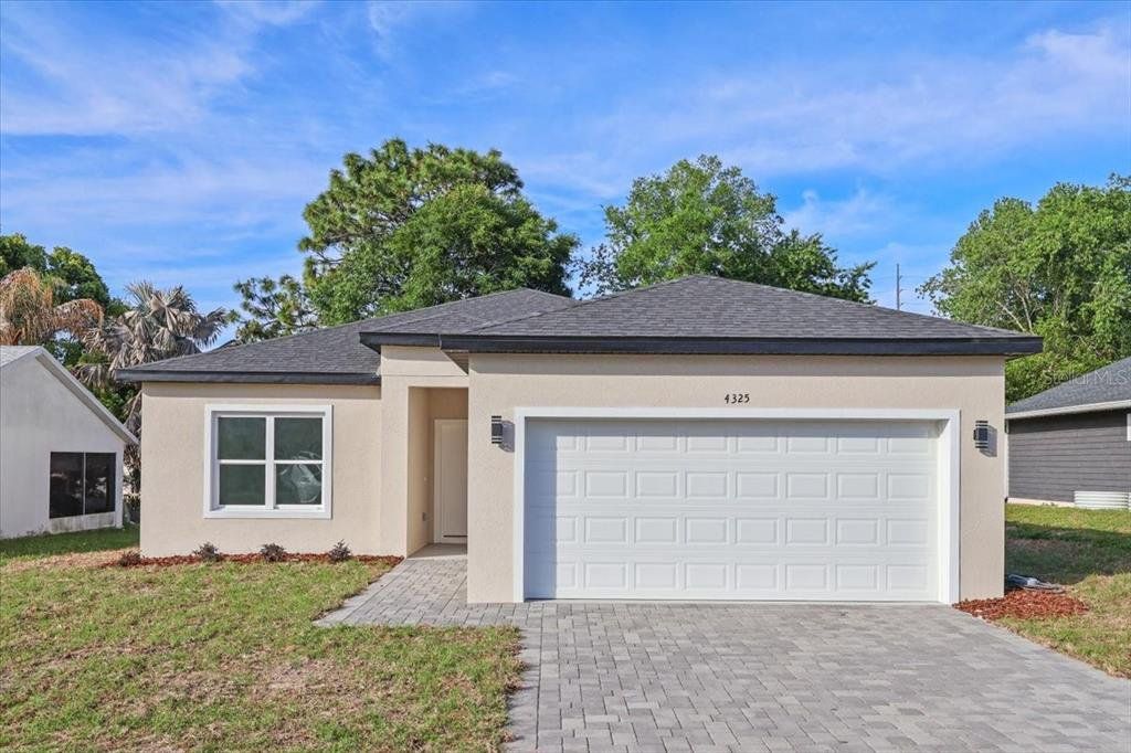 Front exterior of a new home in , Beverly Hills, FL, highlighting curb appeal (Image 1). Front exterior of a new home in , Beverly Hills, FL, highlighting curb appeal (Image 1).