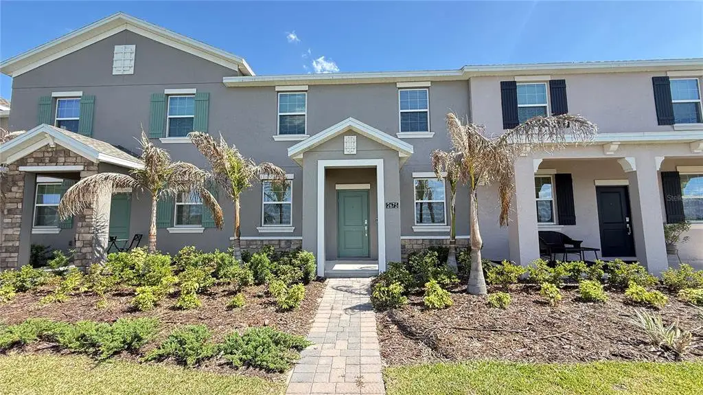 Front exterior of a new home in , Kissimmee, FL, highlighting curb appeal (Image 1). Front exterior of a new home in , Kissimmee, FL, highlighting curb appeal (Image 1).
