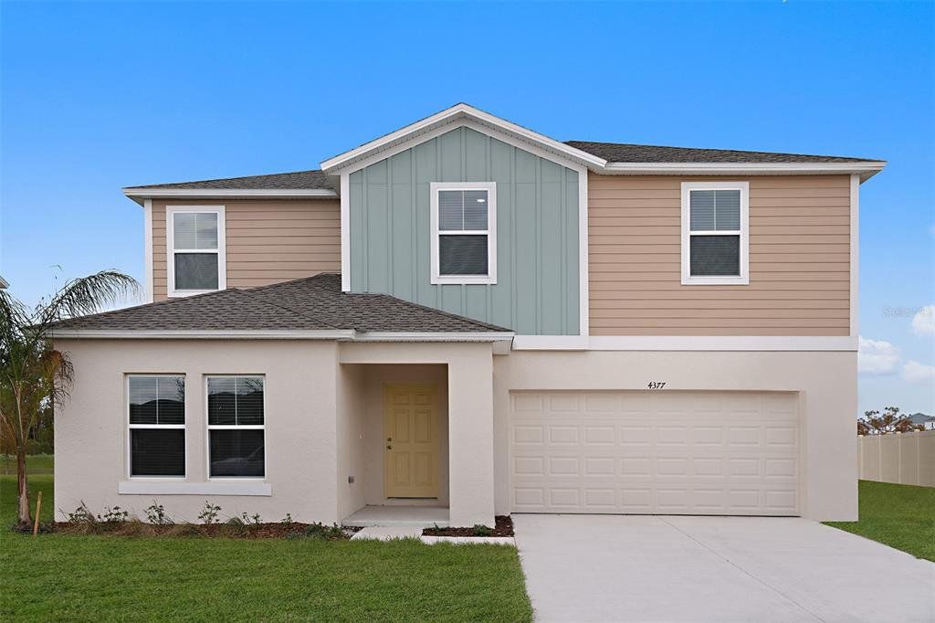 Front exterior of a new home in Lawson Dunes, Haines City, FL, highlighting curb appeal (Image 1). Front exterior of a new home in Lawson Dunes, Haines City, FL, highlighting curb appeal (Image 1).