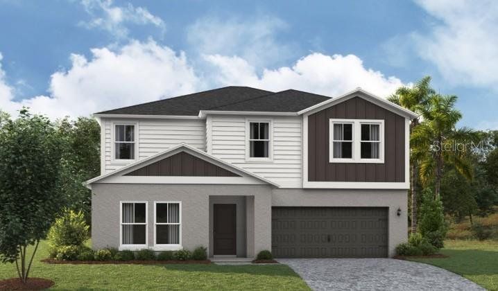 Front exterior of a new home in Pasadena Landing, Wesley Chapel, FL, highlighting curb appeal (Image 1). Front exterior of a new home in Pasadena Landing, Wesley Chapel, FL, highlighting curb appeal (Image 1).
