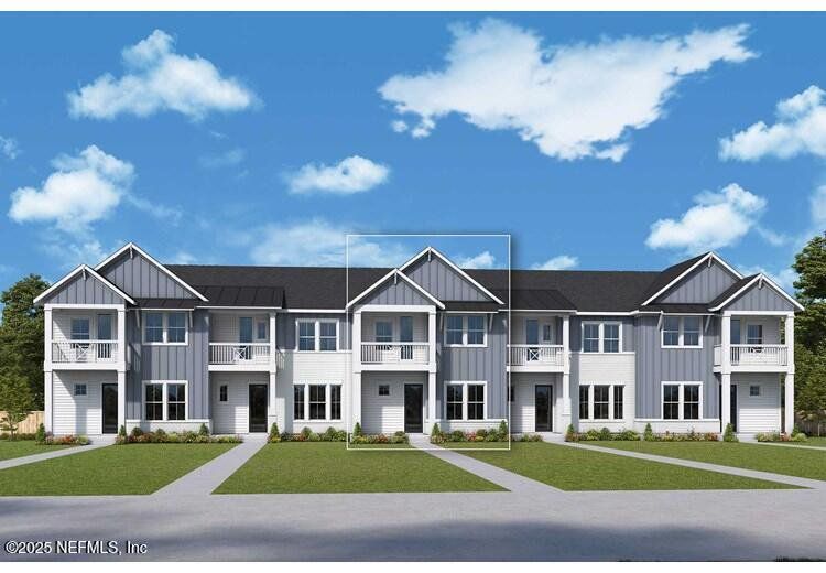 Front exterior of a new home in Seven Pines 24' Rear Entry Townhomes, Jacksonville, FL, highlighting curb appeal (Image 1).
