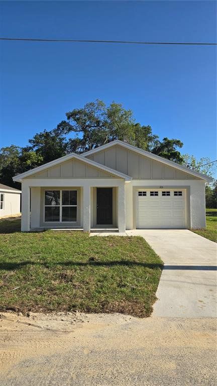 Front exterior of a new home in , Winter Haven, FL, highlighting curb appeal (Image 1). Front exterior of a new home in , Winter Haven, FL, highlighting curb appeal (Image 1).