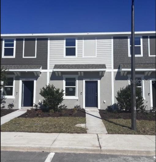 Front exterior of a new home in Westview Community Group Page, Kissimmee, FL, highlighting curb appeal (Image 1). Front exterior of a new home in Westview Community Group Page, Kissimmee, FL, highlighting curb appeal (Image 1).