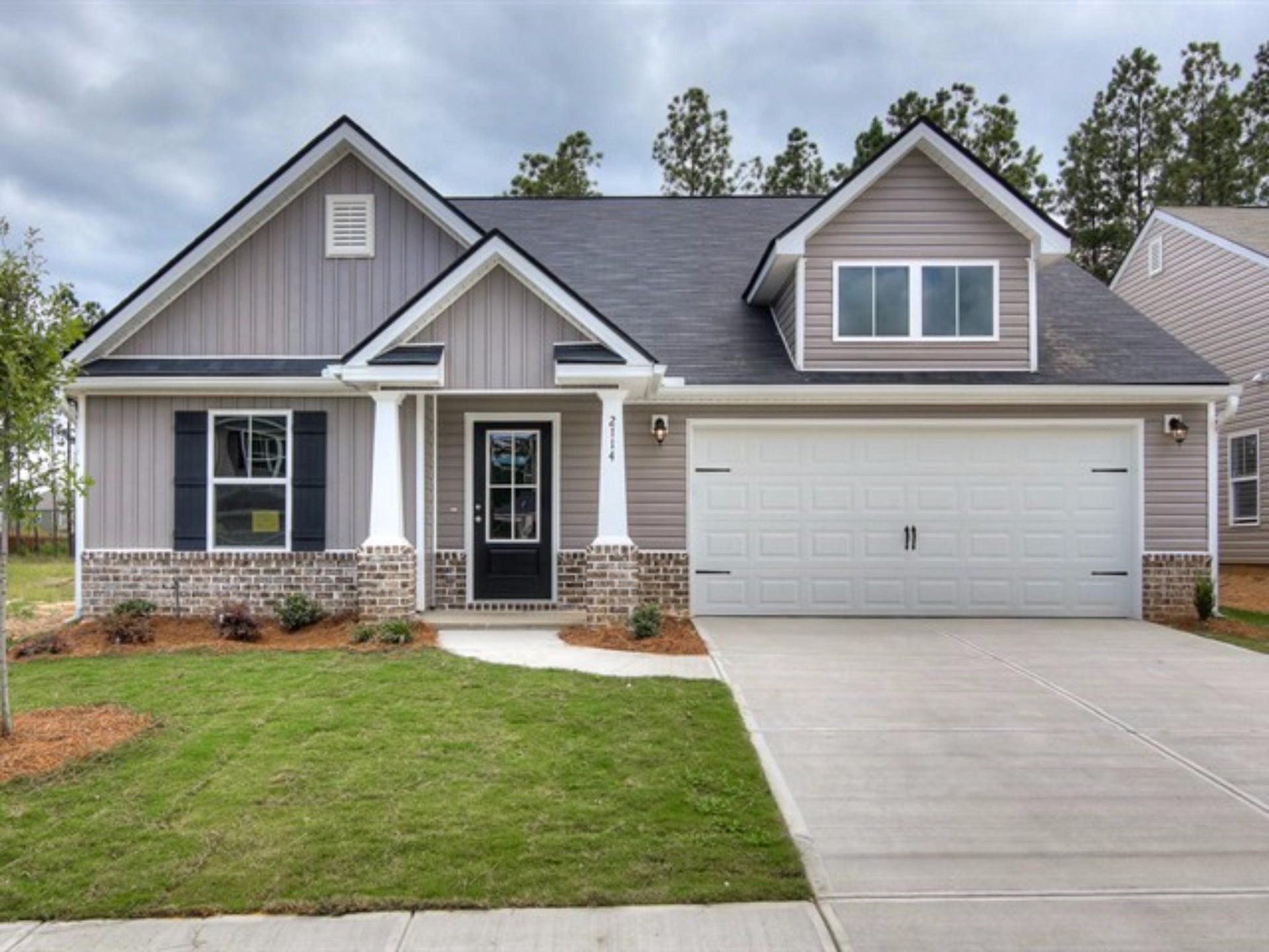 Image 1 representing the Oconee by Winchester Homebuilders in Orchard Park, Covington, GA.