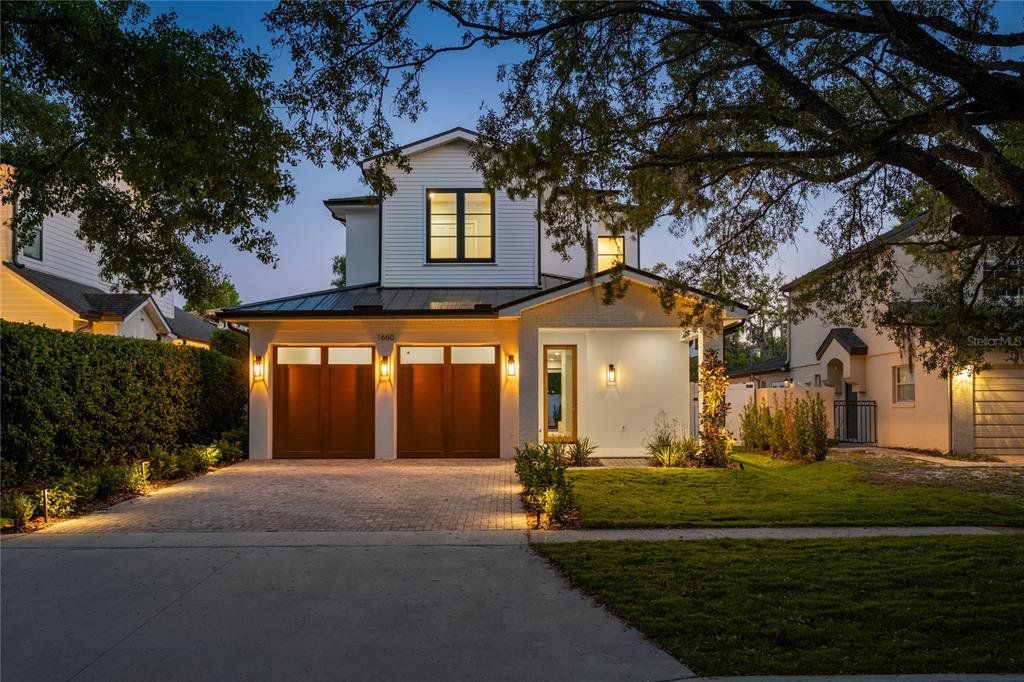 Front exterior of a new home in , Winter Park, FL, highlighting curb appeal (Image 1). Front exterior of a new home in , Winter Park, FL, highlighting curb appeal (Image 1).