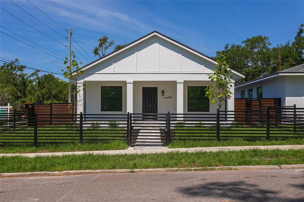 Front exterior of a new home in , St. Petersburg, FL, highlighting curb appeal (Image 1). Front exterior of a new home in , St. Petersburg, FL, highlighting curb appeal (Image 1).