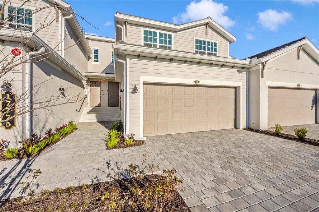 Front exterior of a new home in , Venice, FL, highlighting curb appeal (Image 1). Front exterior of a new home in , Venice, FL, highlighting curb appeal (Image 1).