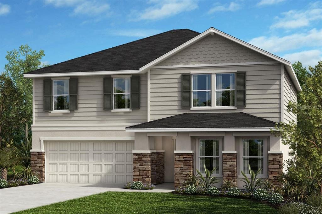 Front exterior of a new home in Sawgrass Lakes II, Parrish, FL, highlighting curb appeal (Image 1). Front exterior of a new home in Sawgrass Lakes II, Parrish, FL, highlighting curb appeal (Image 1).