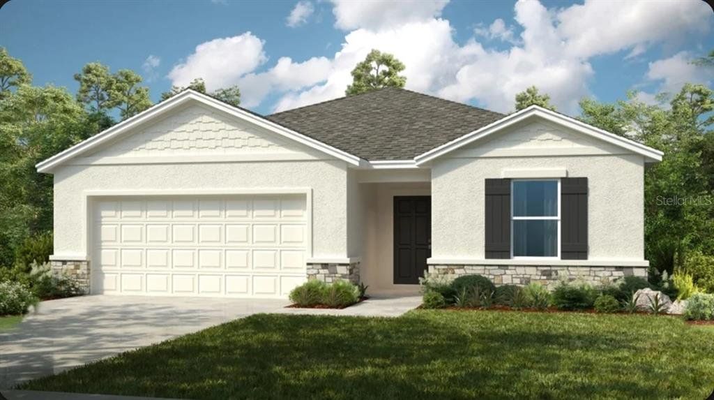 Front exterior of a new home in Waterstone, Groveland, FL, highlighting curb appeal (Image 1). Front exterior of a new home in Waterstone, Groveland, FL, highlighting curb appeal (Image 1).