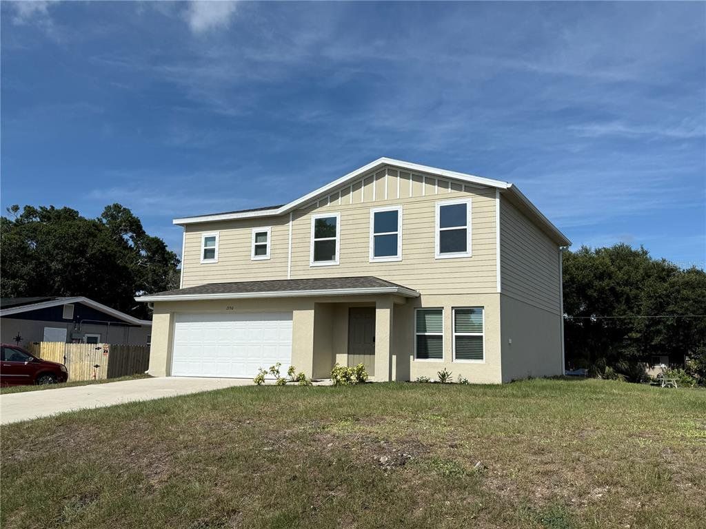 Front exterior of a new home in , Port Charlotte, FL, highlighting curb appeal (Image 1). Front exterior of a new home in , Port Charlotte, FL, highlighting curb appeal (Image 1).