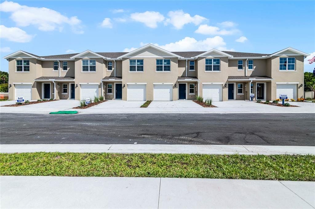 Front exterior of a new home in , Daytona Beach, FL, highlighting curb appeal (Image 1). Front exterior of a new home in , Daytona Beach, FL, highlighting curb appeal (Image 1).