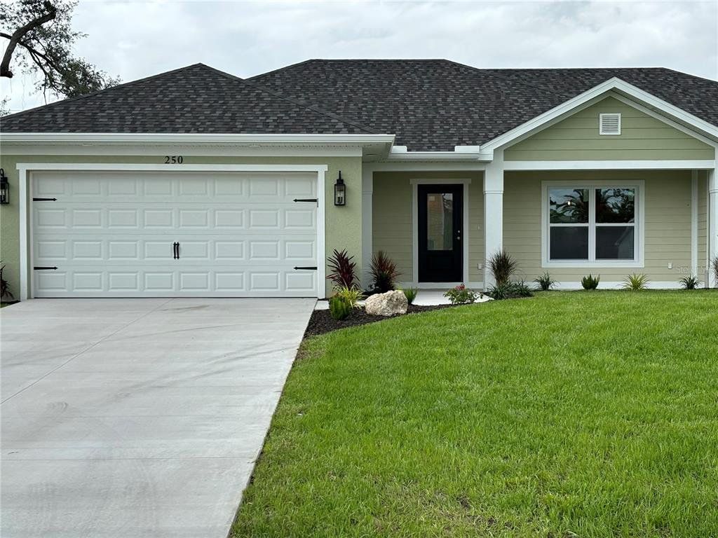 Front exterior of a new home in , Port Charlotte, FL, highlighting curb appeal (Image 1). Front exterior of a new home in , Port Charlotte, FL, highlighting curb appeal (Image 1).