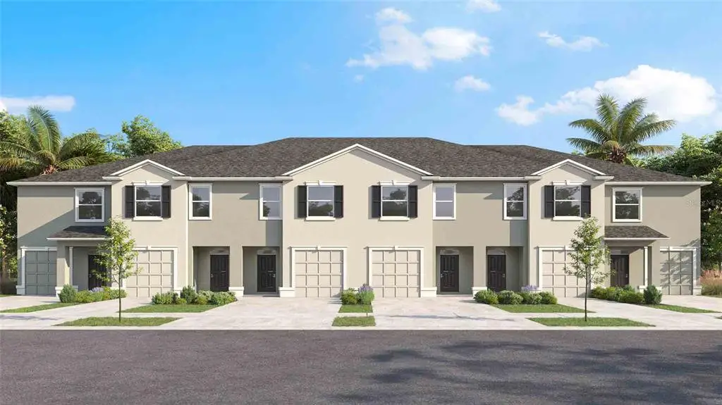 Front exterior of a new home in Angeline, Land O' Lakes, FL, highlighting curb appeal (Image 1). Front exterior of a new home in Angeline, Land O' Lakes, FL, highlighting curb appeal (Image 1).