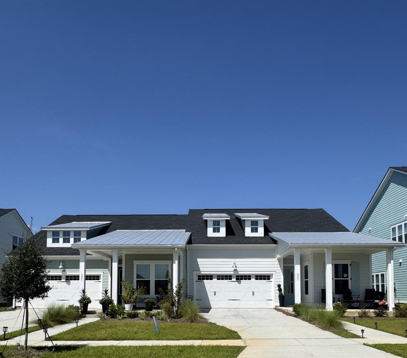 Front exterior of a new home in Carnes Crossroads, Summerville, SC, highlighting curb appeal (Image 1). Front exterior of a new home in Carnes Crossroads, Summerville, SC, highlighting curb appeal (Image 1).